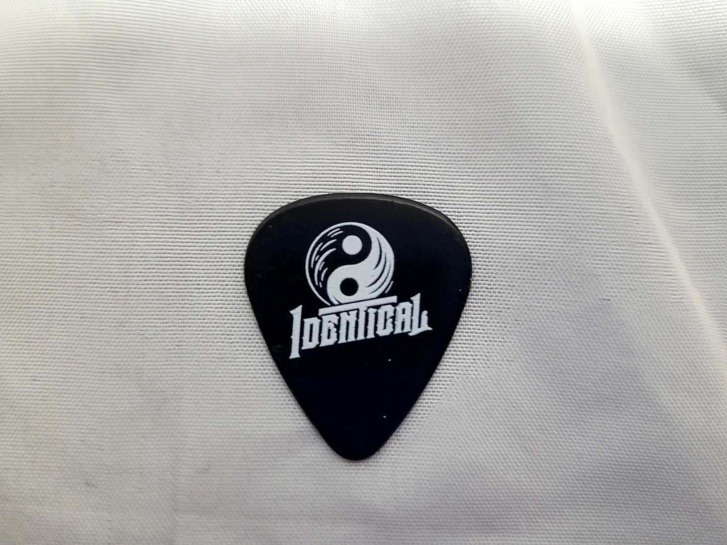 Single Guitar Pick Identical Logo